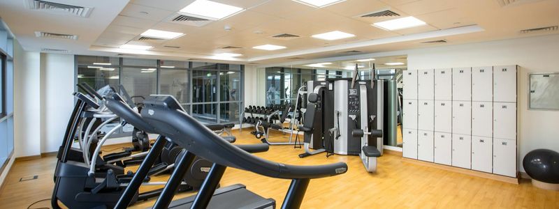 Spacious empty room prepared for cardio exercises